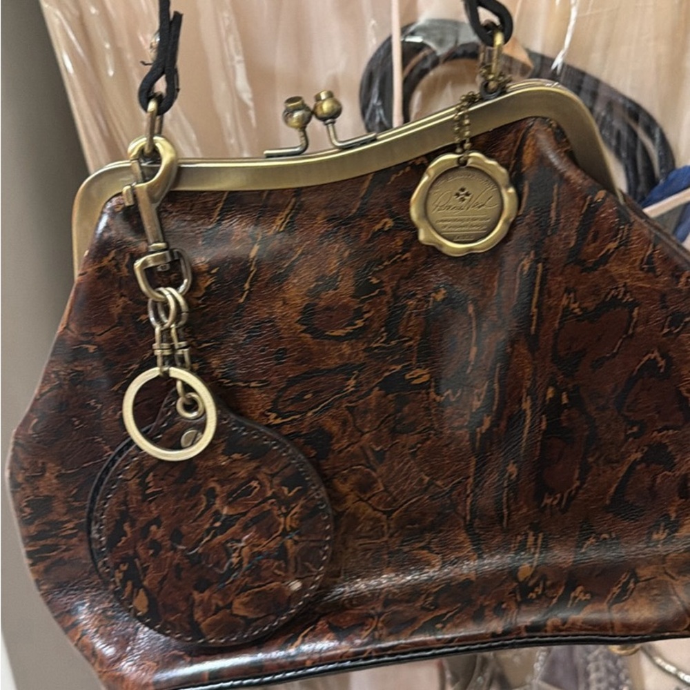 Patricia Nash Laurena leather framed bag in an abstract of animal print